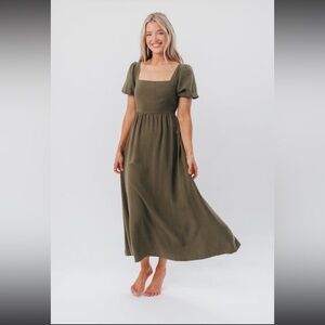 Green open back dress